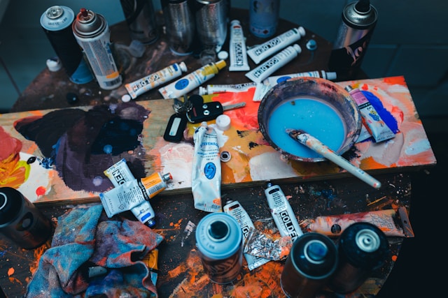 brushes and paint on the table
