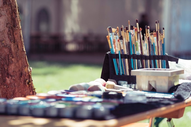 brushes and paint on the table