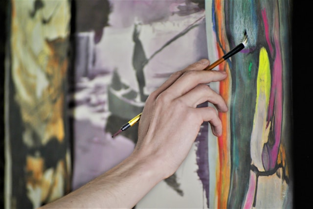 someone is painting a picture